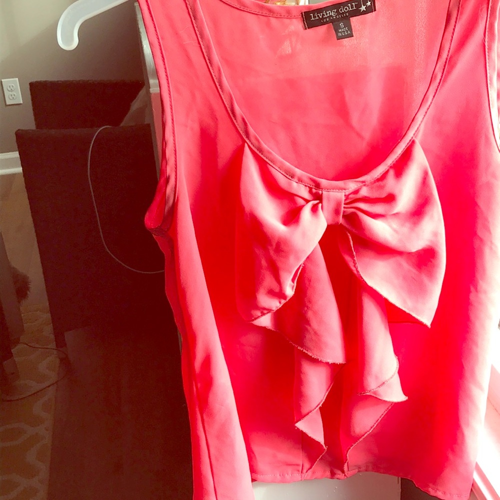 Pink sleeveless summer tank.